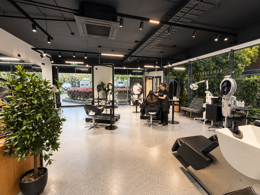 Styling chairs and backlit mirrors at Terreamer salon, Melbourne